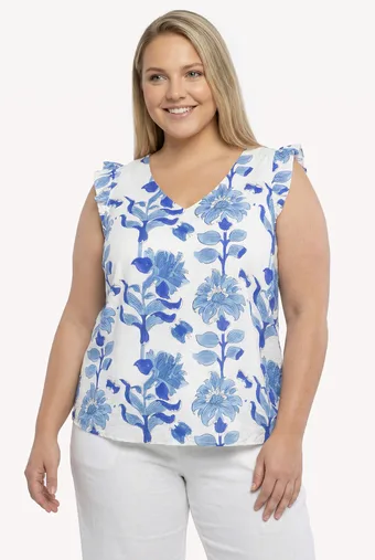 Blusa ecrù con fiori blu
