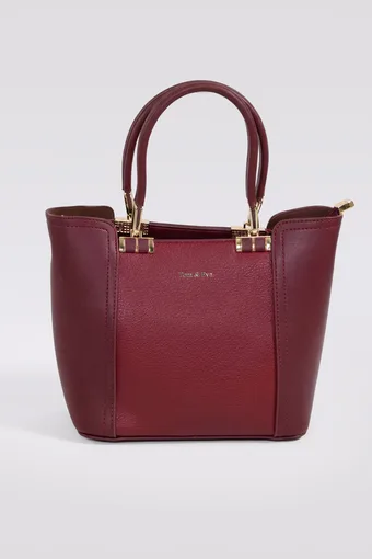 Borsa turchese con elementi dorati