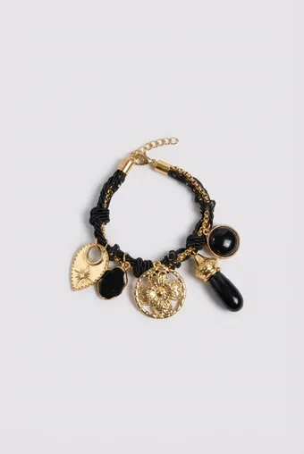 bracciale in oro con pietra bianca