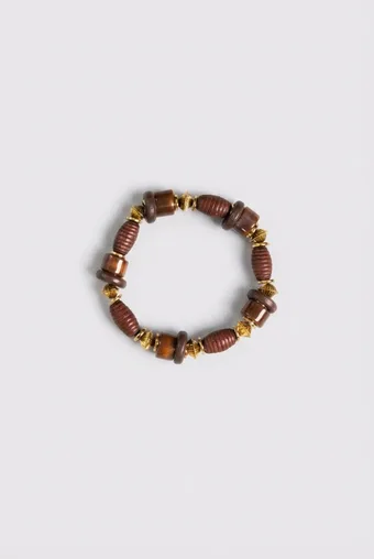 copia di bracciale in oro con pietra bianca