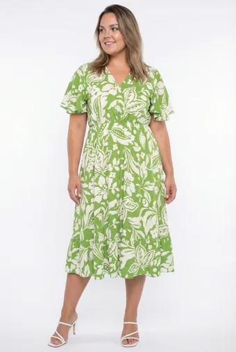 Abito verde chiaro con fiori beige