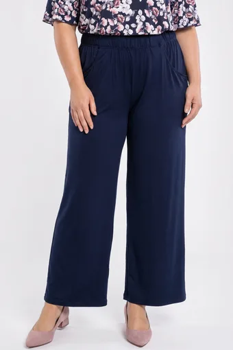 Pantaloni neri con bottoni dorati e neri
