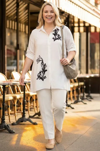 camicia bianca con ricamo nero