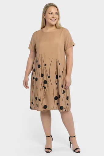 Abito beige con motivi neri