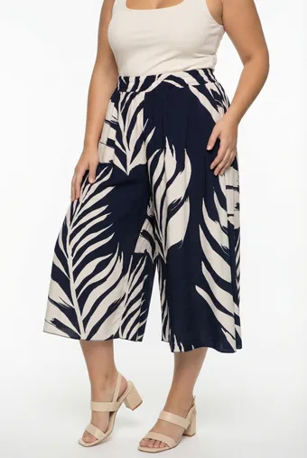 Pantaloni blu navy beige con foglie