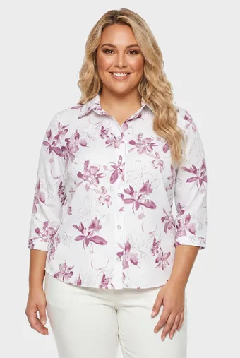 camicia color crema con fiori rosa